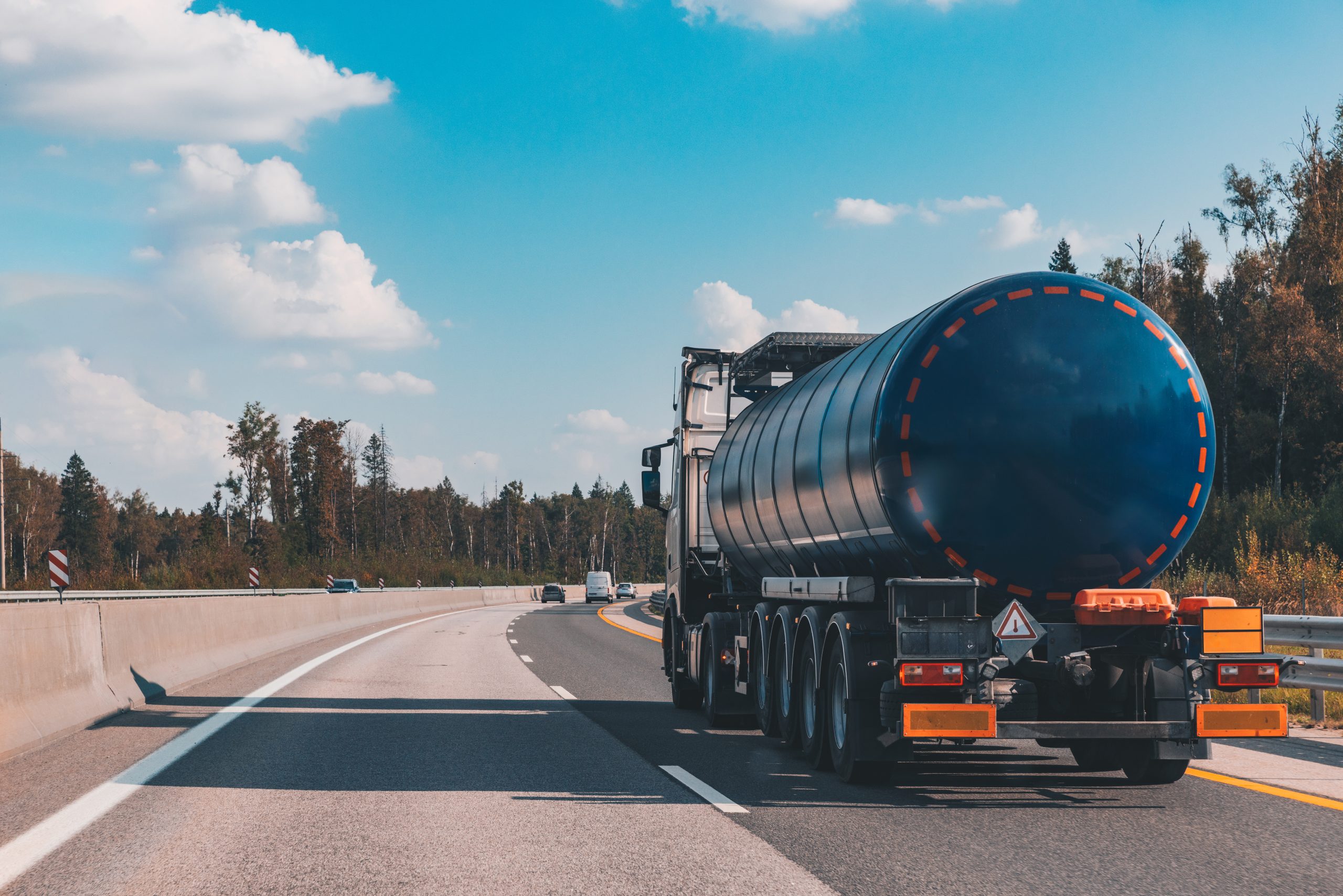 Fuel Tanker Truck On The Highway Asphalt Road On