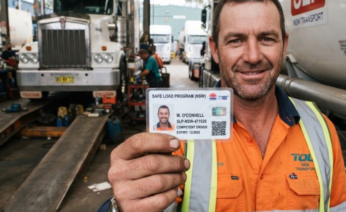 Safe Load Program card held by a NSW truck driver